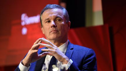 Le président du parti Debout la France, Nicolas Dupont-Aignan, lors du cinquième sommet de l'économie organisé par "Challenges" le 6 décembre 2018 à Paris. (ERIC PIERMONT / AFP)