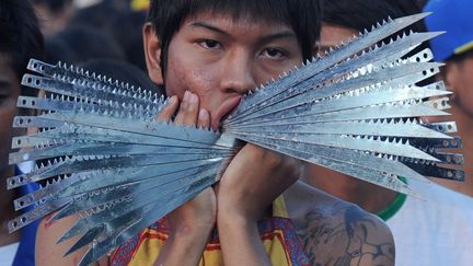 Pendant 9 jours, la communaut&eacute; chinoise de la ville s'impose un r&eacute;gime v&eacute;g&eacute;tarien. (PORNCHAI KITTIWONGSAKUL / AFP)