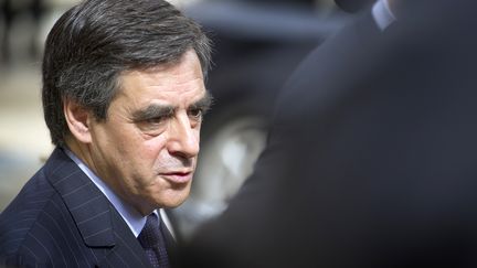 Fran&ccedil;ois Fillon quitte le palais de l'Elys&eacute;e, le 9 mai 2012, &agrave; l'issue du dernier conseil des ministres du quinquennat de Nicolas Sarkozy.&nbsp; (LIONEL BONAVENTURE / AFP)