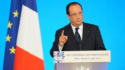 Fran&ccedil;ois Hollande annonce que la France va "punir" les responsables du massacre chimique du 21 ao&ucirc;t en Syrie, lors de la conf&eacute;rence des ambassadeurs &agrave; l'Elys&eacute;e, le 27 ao&ucirc;t 2013. (WITT / SIPA)