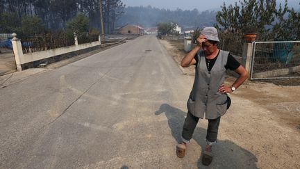 Une habitante de Barraca da Boavista, en pleurs après l'incendie qui ravage le centre du Portugal. (MAXPPP)