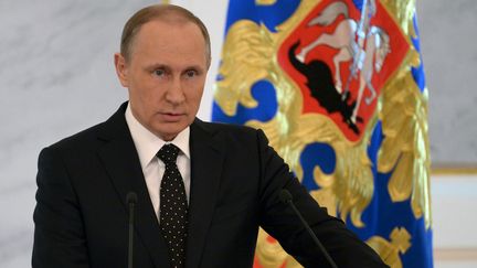 Vladimir Poutine,&nbsp;lors de son intervention&nbsp;annuelle devant les parlementaires, le gouvernement et les gouverneurs des régions de Russie, au Kremlin, à Moscou (Russie), le 3 décembre 2015.&nbsp; (ALEKSEY NIKOLSKYI / RIA NOVOSTI / AFP)