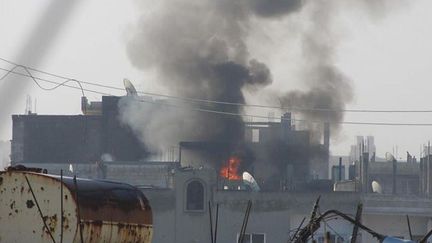 Photo du quartier de Baba Amr&nbsp;bombard&eacute; &agrave; Homs (Syrie), publi&eacute;e par l'opposition le 21 f&eacute;vrier 2012. (LCC SYRIA / AFP)