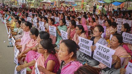 Manifestation contre la violence sexuelle envers les femmes, à Imphal (Inde), le 21 juillet 2023. (- / AFP)