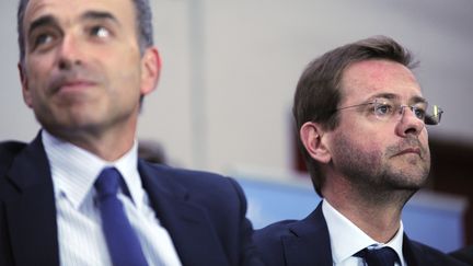 Le d&eacute;put&eacute;-maire de Meaux, Jean-Fran&ccedil;ois Cop&eacute;, et son directeur de cabinet, J&eacute;r&ocirc;me Lavrilleux, lors d'un meeting &agrave; Evreux (Eure), le 24 mai 2014. (ERIC BAUDET / SIPA)