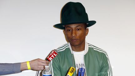 Pharrell Williams le 24 février 2014 à Paris, en conférence de presse pour présenter son nouvel album solo "G I R L".
 (Thomas Samson / AFP)