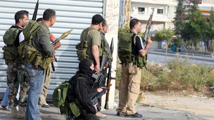 Des combattants du Hezbollah, au sud-est de Beyrouth (Liban), le 11 mai 2008. (RAMZI HAIDAR / AFP)