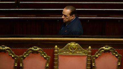 L'ancien chef du gouvernement italien Silvio Berlusconi, le 2 octobre 2013 au S&eacute;nat &agrave; Rome (Italie). (FILIPPO MONTEFORTE / AFP)