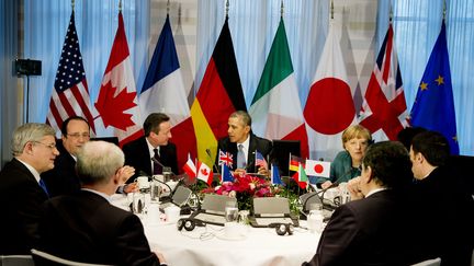 Les dirigeants du G7 r&eacute;unis &agrave; la Haye (Pays-Bas), lundi 24 mars 2014. (JERRY LAMPEN / AFP)