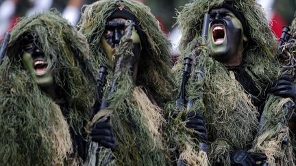 Les forces sp&eacute;ciales mexicaines d&eacute;filent pour c&eacute;l&eacute;brer l'anniversaire du jour de l'ind&eacute;pendance du pays &agrave; Mexico (Mexique), le 16 septembre 2012. (REUTERS)