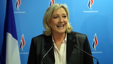 Marine Le Pen, la pr&eacute;sidente du Front national, le 30 mars 2014 &agrave; Nanterre (Hauts-de-Seine), au QG du parti. (KENZO TRIBOUILLARD / AFP)