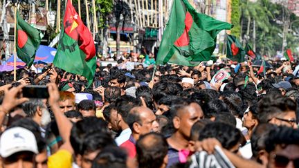 Bangladesh National Party supporters march in Dakka, Bangladesh on August 7, 2024. (MUNIR UZ ZAMAN / AFP)