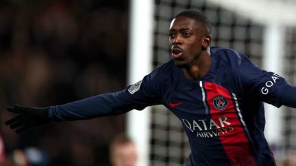 Le Français Ousmane Dembélé célébrant son premier but avec le PSG face à l'AS Monaco en Ligue 1, le 24 novembre 2023. (FRANCK FIFE / AFP)