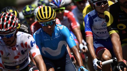 Le Colombien Nairo Quintana roule avec le peloton dans la 18e étape du 105e Tour de France entre Trie-sur-Baise (Hautes-Pyrénées) et Pau (Pyrénées-Atlantiques), le 18 juillet 2018. (JEFF PACHOUD / AFP)