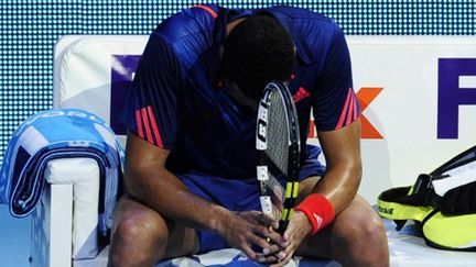 Jo-Wilfried Tsonga prostré sur sa chaise