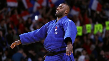 Teddy Riner vainqueur de son 7e Grand Slam de Paris devant son public, le 5 février 2023. (ANNE-CHRISTINE POUJOULAT / AFP)