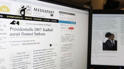 Le site internet Mediapart a publi&eacute; le 28 avril une note libyenne accusant Sarkozy d'avoir &eacute;t&eacute; financ&eacute; par Kadhafi. (KENZO TRIBOUILLARD / AFP)