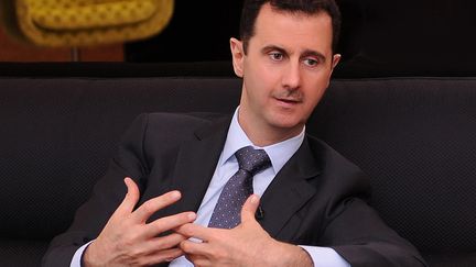 Le pr&eacute;sident syrien Bachar Al-Assad lors d'une interview pour un journal turc, le 3 juillet 2012 &agrave; Damas (Syrie). (SANA / AFP)