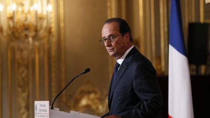 Fran&ccedil;ois Hollande r&eacute;pond aux questions des journalistes lors d'uen conf&eacute;rence de presse au Palais de l'Elys&eacute;e le 18 septembre 2014 ( PATRICK KOVARIK / AFP)