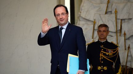 Le pr&eacute;sident Fran&ccedil;ois Hollande &agrave; l'Elys&eacute;e, le 23 d&eacute;cembre 2013. (BERTRAND GUAY / AFP)