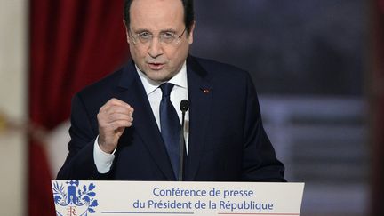 Le pr&eacute;sident de la R&eacute;publique, Fran&ccedil;ois Hollande, le 14 janvier 2014 &agrave; l'Elys&eacute;e. (ALAIN JOCARD / AFP)