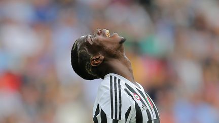 Paul Pogba sera du voyage. (MARCO BERTORELLO / AFP)