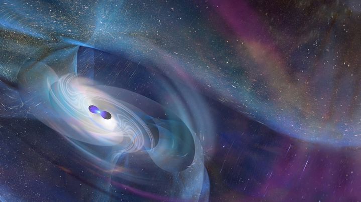 Deux étoiles à neutrons en collision créent une onde gravitationnelle qui se propage sur le tissu de l'espace-temps. Des ondes gravitationnelles ont été détectées par les télescopes LIGO et Virgo, le 17 août 2017. (Image d'artiste) (DON DIXON / LEEMAGE VIA AFP)