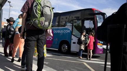 L'UFC-Que Choisir a assigné en justice deux des principaux acteurs des "cars Macron", Ouibus et Flixbus, leur reprochant des conditions générales "abusives" voire "illicites". (KENZO TRIBOUILLARD / AFP)