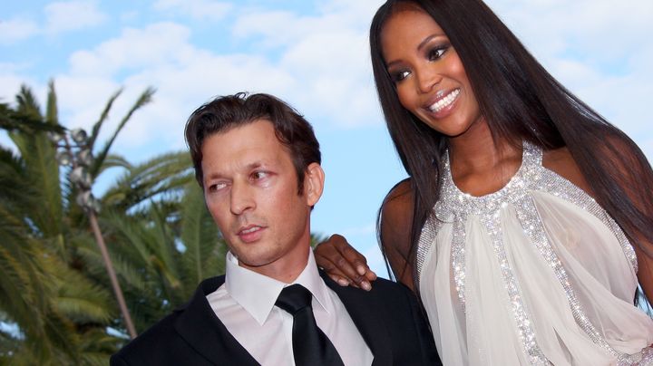 L'arnaqueur des stars Christophe Rocancourt, ici avec l'ex-top Naomi Campbell, &agrave; Cannes en 2008. (VALERY HACHE / AFP)