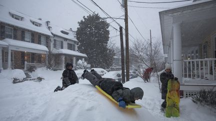 Les enfants de Washington, eux, s'en donnent à coeur joie avec leurs luges. (MAXPPP)