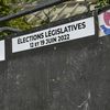 Un panneau électoral pour les élections législatives des 12 et 19 juin 2022, à Paris.&nbsp; (MAGALI COHEN / HANS LUCAS / AFP)