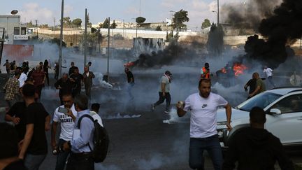 Au nord de Ramallah, des affrontements entre Palestiniens et soldats israéliens, le 13 octobre 2023. (JAAFAR ASHTIYEH / AFP)