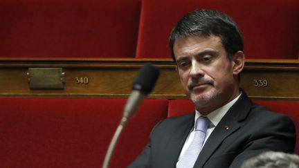 Manuel Valls lors de la séance des Questions au gouvernement de l'Assemblée nationale, le 19 décembre 2017. (PATRICK KOVARIK / AFP)