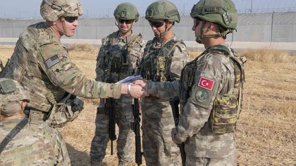 Des soldats américains et turcs en patrouille dans le nord de la Syrie, le 4 octobre 2019.&nbsp; (MAXPPP)