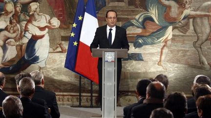 Le pr&eacute;sident de la R&eacute;publique, Fran&ccedil;ois Hollande, pr&eacute;sente ses v&oelig;ux aux parlementaires, mercredi 16 janvier 2013.&nbsp; (REMY DE LA MAUVINIERE / AFP)