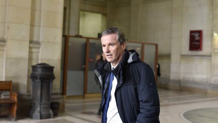 Nicolas Dupont-Aignan quitte le tribunal de Paris, le 7 février 2018. (PATRICE PIERROT / CROWDSPARK / AFP)