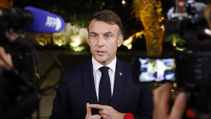 Emmanuel Macron s'adresse aux médias à Rio de Janeiro, au Brésil, le 18 novembre 2024, lors du sommet du G20. (LUDOVIC MARIN / AFP)