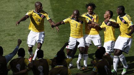 La joie des joueurs colombiens (ADRIAN DENNIS / AFP)