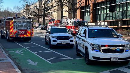 American secret service vehicles block access to a street leading to the Israeli embassy in Washington, where an American soldier set himself on fire, February 25, 2024. (MANDEL NGAN / AFP)