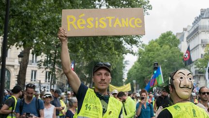 Des participants à une précédente manifestation des "gilets jaunes" à Paris, le 13 juillet 2019. (ESTELLE RUIZ / AFP)