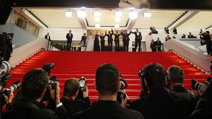 Photographes en bas des marches du palais des festivals, en mai 2014
 (Valéry Hache / AFP)