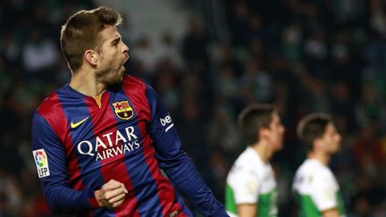 La joie de Gerard Piqué (Barcelone) (JOSE JORDAN / AFP)