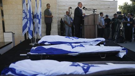 &nbsp; (C'est le Premier ministre, Benjamin Netanyahu, qui a prononcé l'éloge funèbre des trois jeunes Israéliens © REUTERS/Baz Ratner)