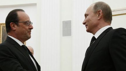 François Hollande et Vladimir Poutine au Kremlin, à Moscou, le 26 novembre 2015. (AFP - POOL - ALEXANDER ZEMLIANICHENKO)