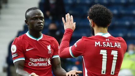 Liverpool sera orphelin de ses stars Sadio Mané et Mohamed Salah pendant un mois. (RUI VIEIRA / POOL)