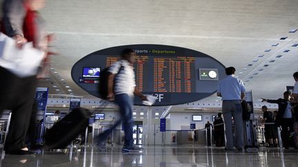 Dans le terminal 2F de l'aéroport Roissy-Charles-de-Gaulle (Val-d'Oise), le 15 septembre 2014. (KENZO TRIBOUILLARD / AFP)