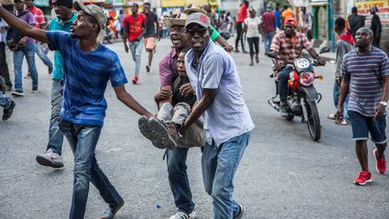 Des émeutes éclatent à Port-au-Prince (Haïti), le 18 novembre 2019. (VALERIE BAERISWYL / AFP)