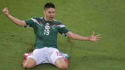 Oribe Peralta a ouvert le score pour le Mexique (GABRIEL BOUYS / AFP)