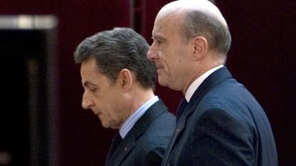 Nicolas Sarkozy et Alain Jupp&eacute;, le 20 janvier 2012, &agrave; l'Elys&eacute;e, &agrave; Paris.&nbsp; (CHARLES PLATIAU / AFP)