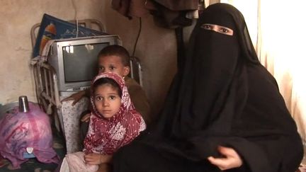 Mère d'une famille de 4 enfants, Oum Hamed ne peut pas les nourrir tous les jours (AFP)